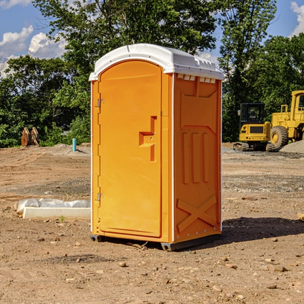 what is the maximum capacity for a single portable toilet in Evart